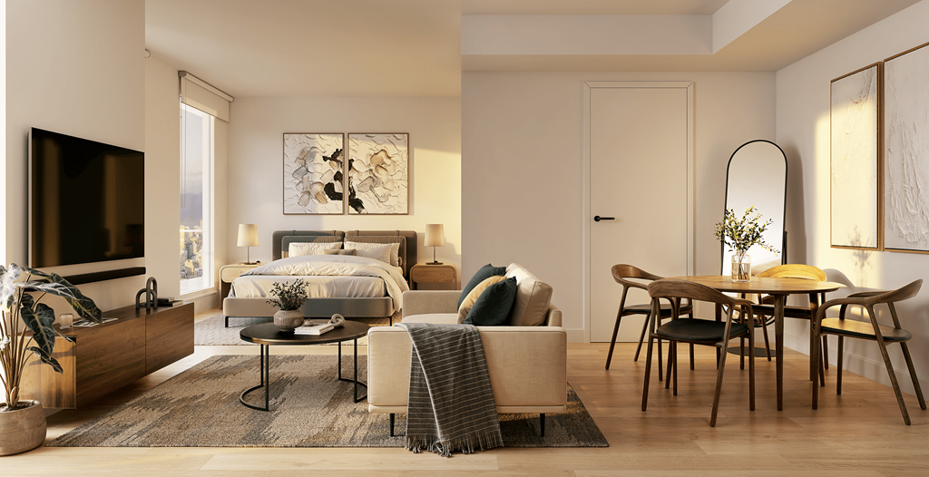 A modern bedroom with a large bed, a TV, a table and chairs, and a rug.