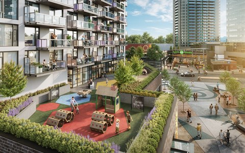 A playground area is surrounded by apartment buildings.