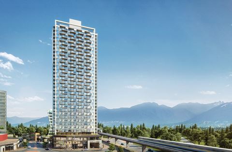 a tall building with a view of the water and mountains
