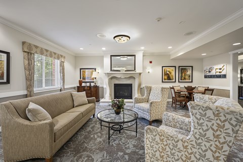 A living room with a fireplace and a couch.