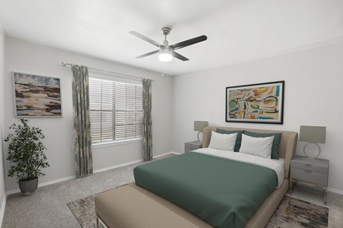 A bedroom with a bed, nightstand, and a ceiling fan. at Avalon Villas Apartments , Irving, TX, 75062