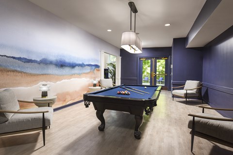 Game room with pool table and seating at Chestnut Oaks Apartments, Fort Washington, 20744