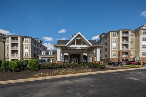 Apartment community entrance with brick columns at Regency Crest Apartments, Ellicott City, Maryland