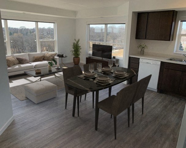 a dining room and living room with a table and chairs