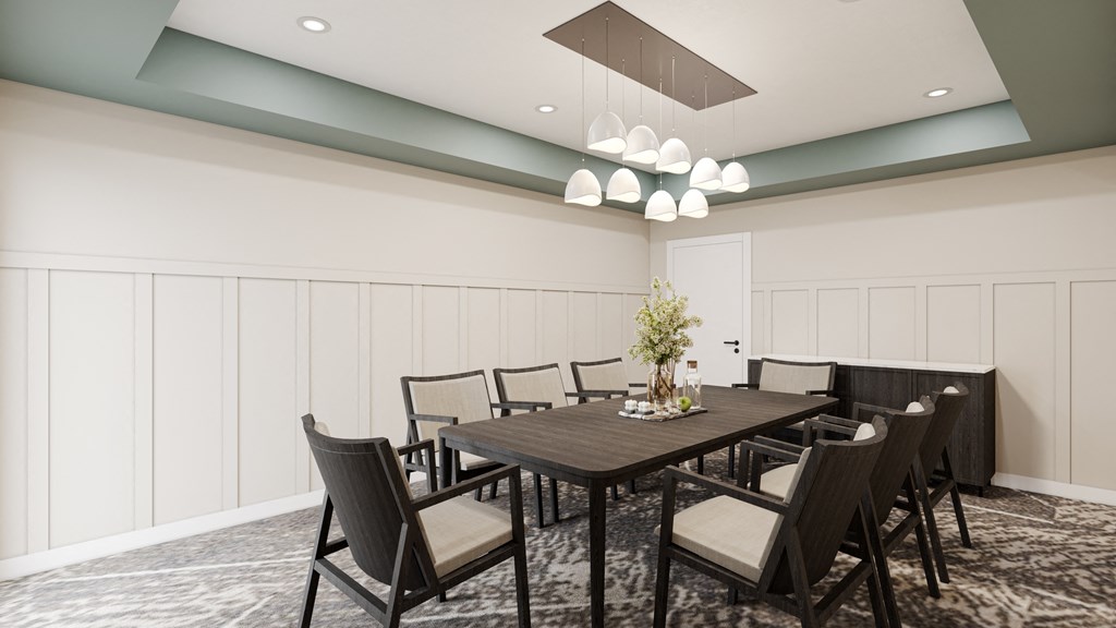 a conference room with a long wooden table and chairs