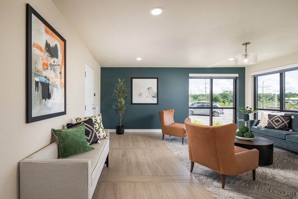 the residence on lamar apartment living room with couches and chairs