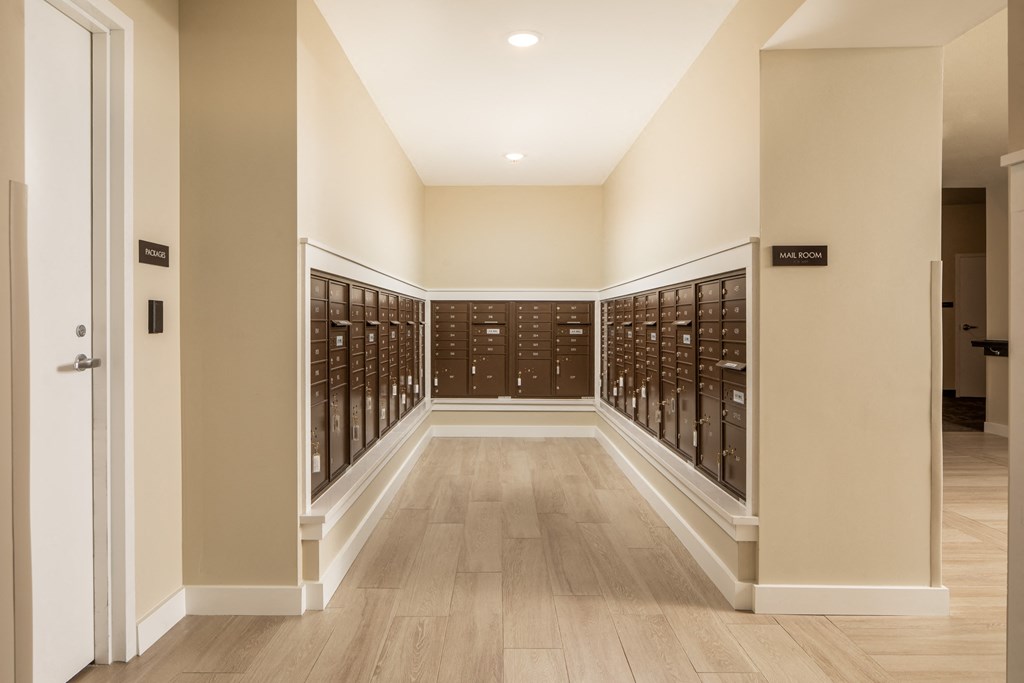 a large wine cellar with rows of wine racks and a door