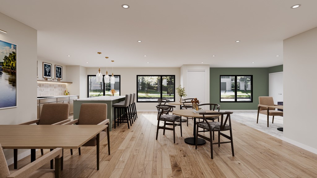 A modern dining room with wooden floors and furniture.