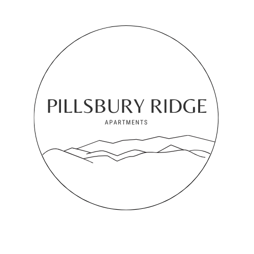 A logo for Pillsbury Ridge Apartments with a mountain range silhouette.