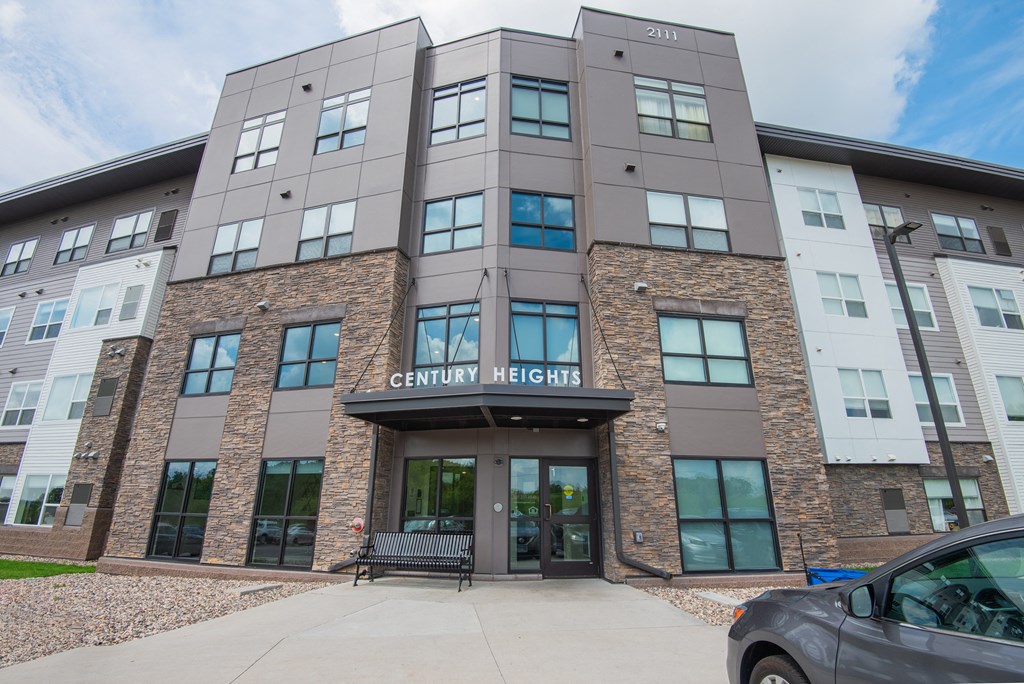 a building with a car parked in front of it