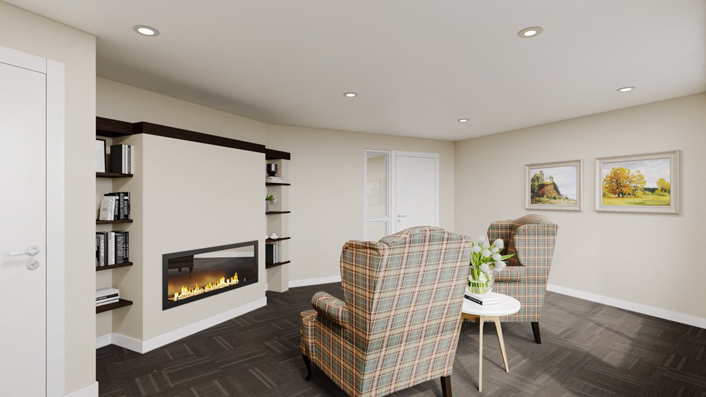 a living room with two chairs and a fireplace