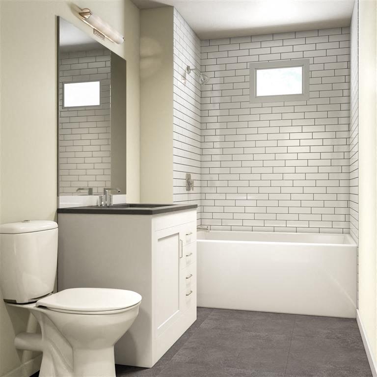 a bathroom with a toilet and a sink and a bath tub