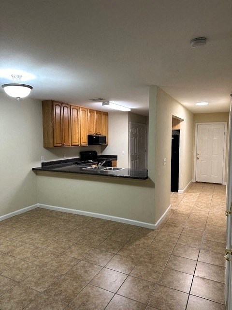 2 bedroom dining, hall and kitchen
