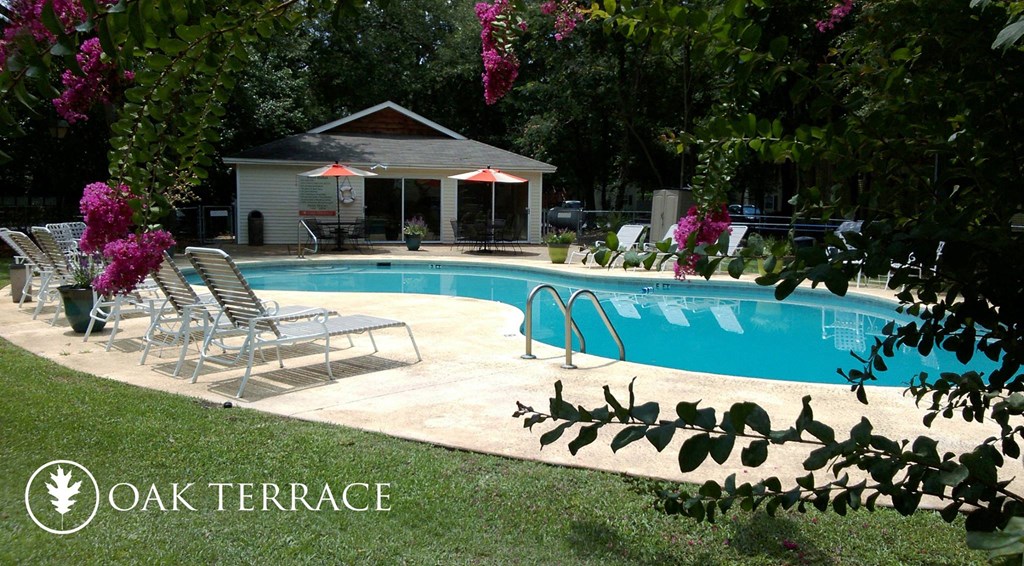 a swimming pool in the backyard of a house