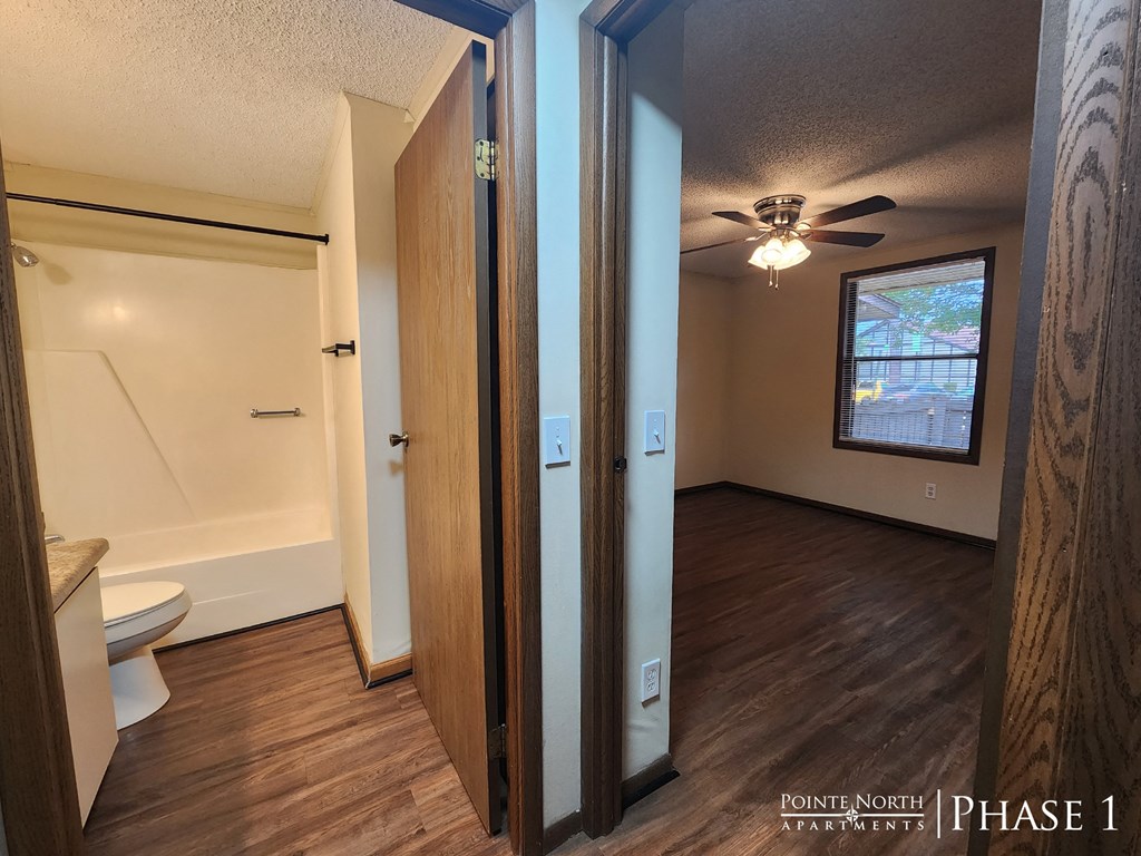 the master bedroom and bathroom from the living room