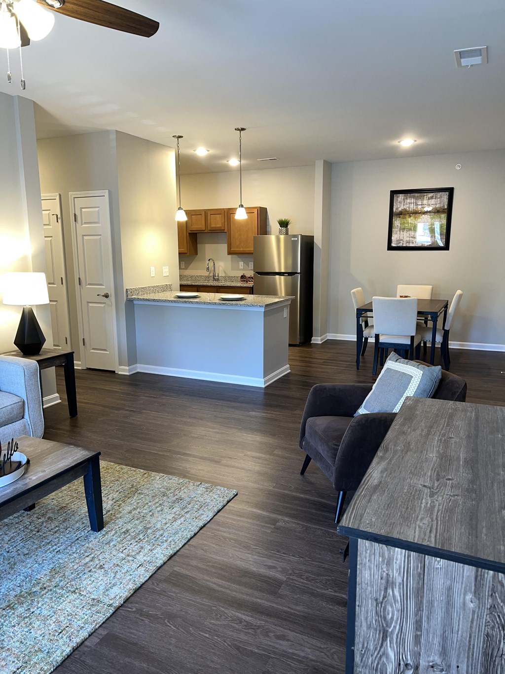 a view of the 2 bedroom standard dining and kitchen area from the living room