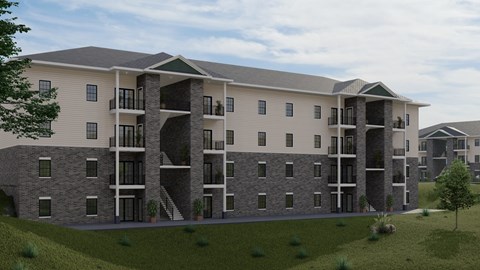 A large apartment complex with multiple balconies and doors.