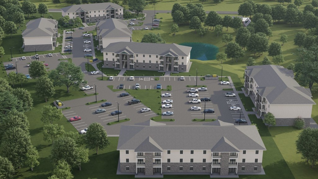 A rendering of a large building complex with a parking lot in front.