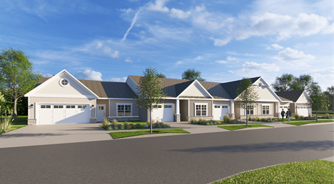 A row of houses with a clear blue sky above them.
