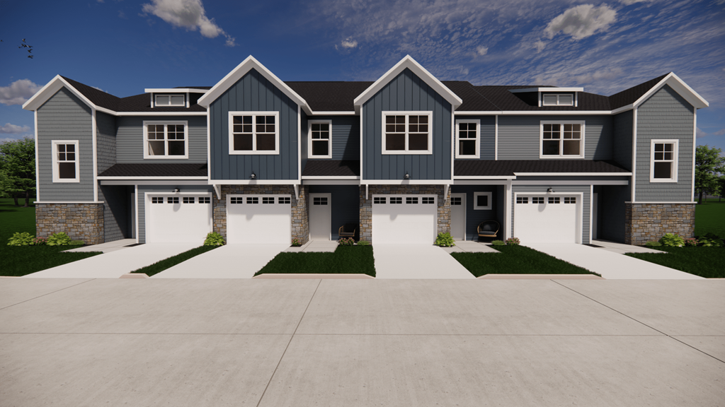 A large, modern house with a grey and white exterior and a stone pillar.