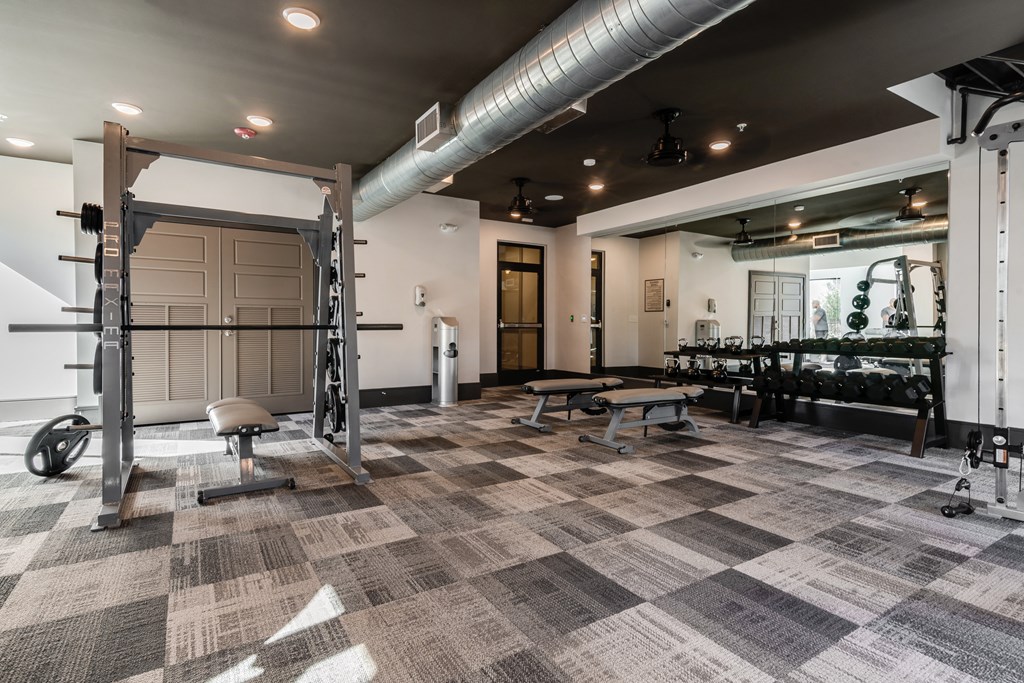 the gym at the flats at big tex apartments