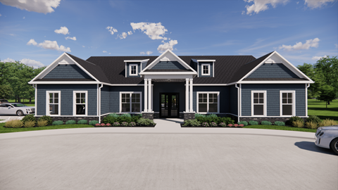A large house with a driveway in front.