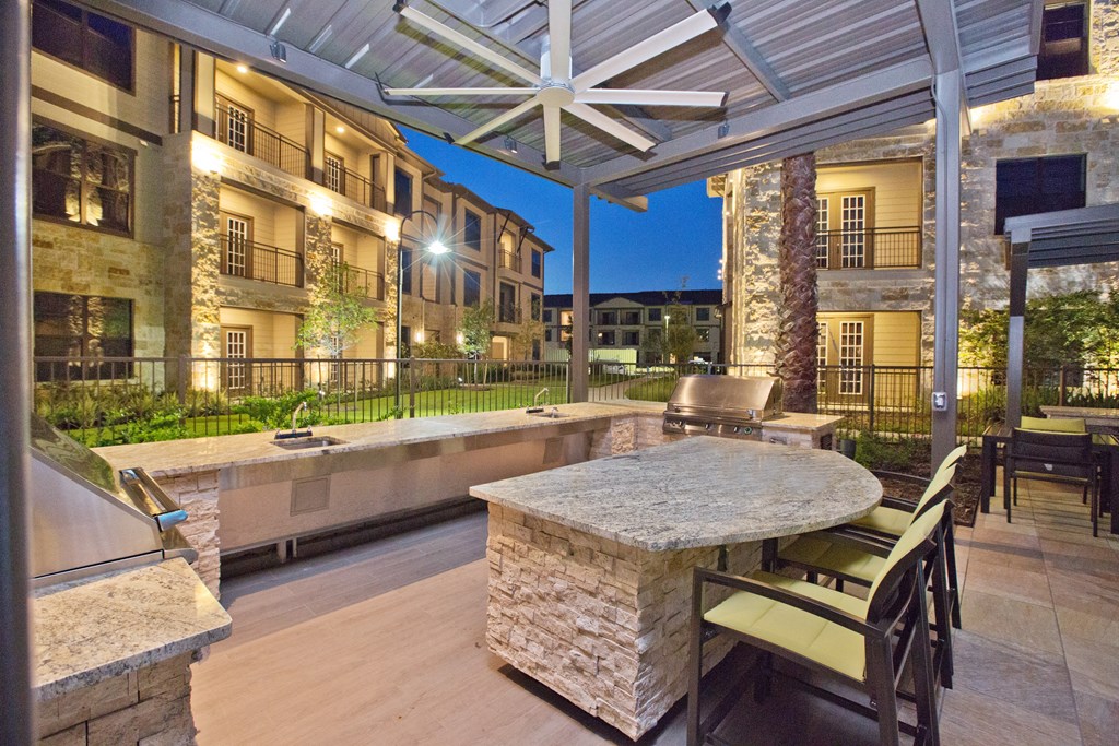the preserve at ballantyne commons clubhouse with patio and dining area