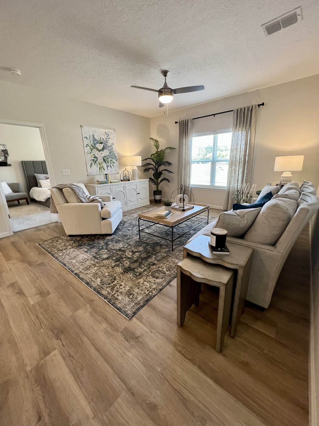 a living room with a couch and a table