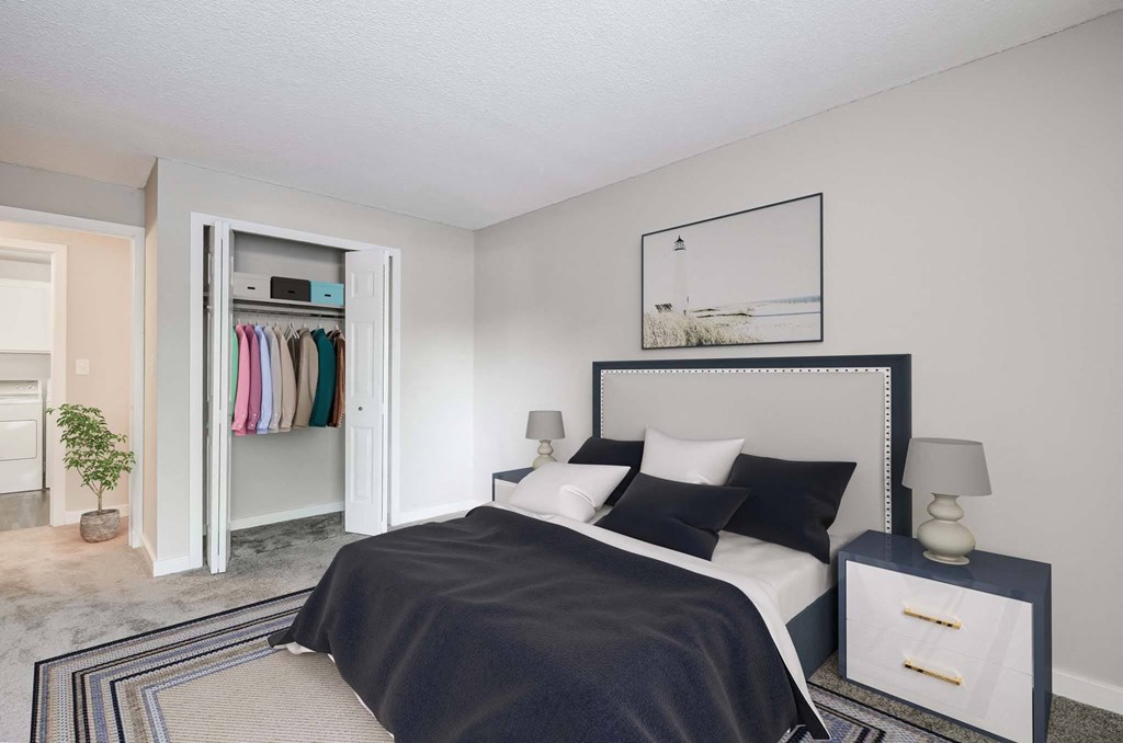 a bedroom with a bed and a closet