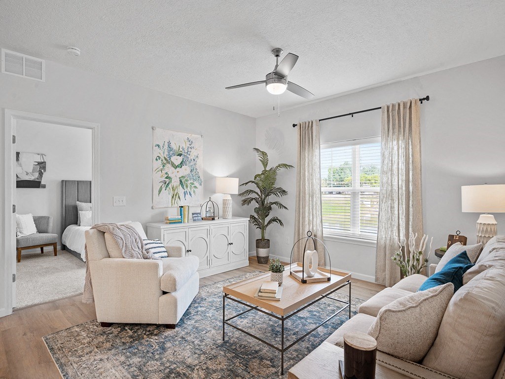 a living room with couches and a coffee table