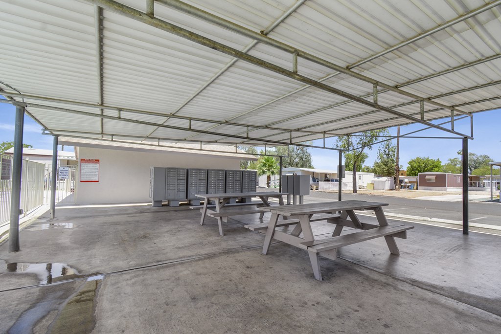 Ramada area with picnic tables and mailboxes