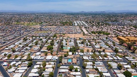 A large aerial view of a residential area with numerous houses and streets.