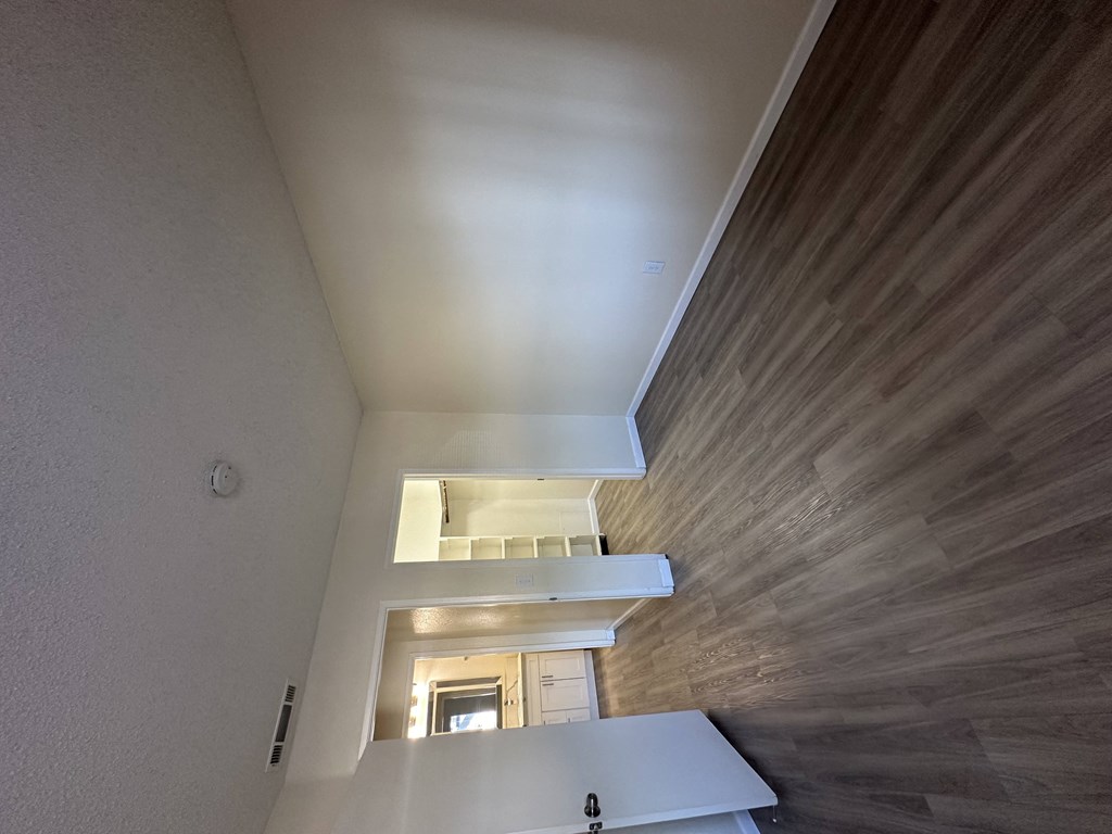 a view of the kitchen from the loft