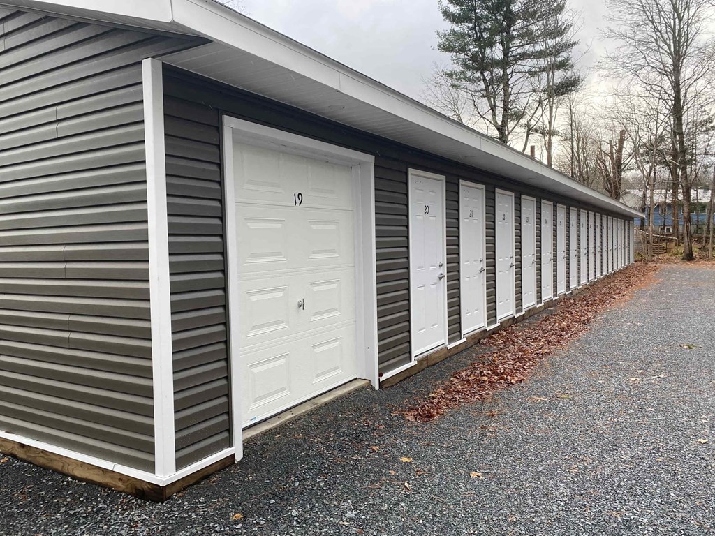 A series of garage doors numbered from 10 to 19.