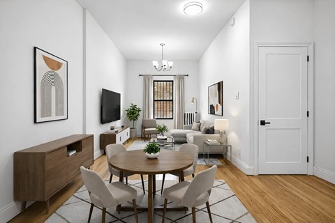 A modern dining room with a wooden table and chairs.