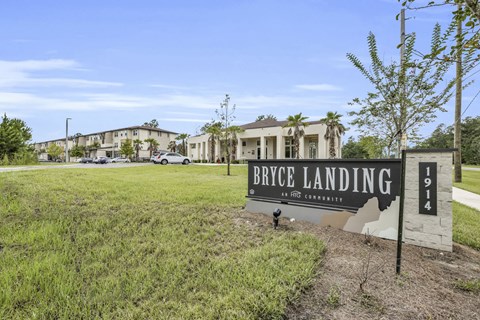 a sign that reads bicycle landing in front of some buildings
