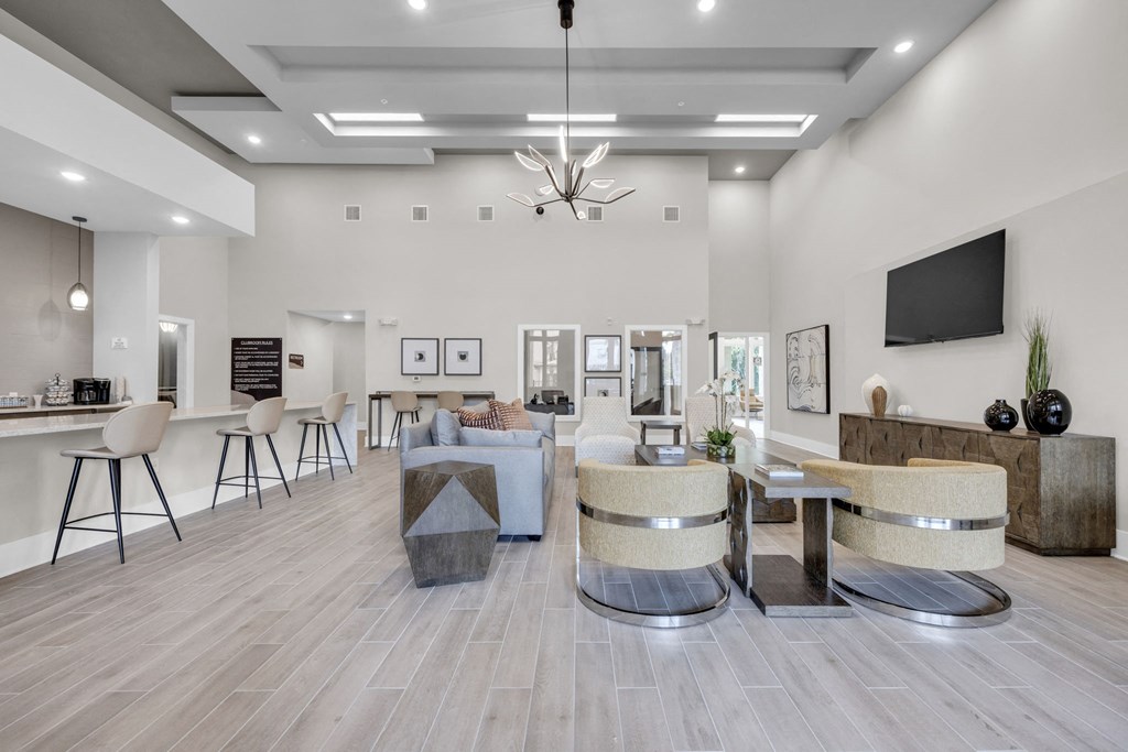a living room with furniture and a tv