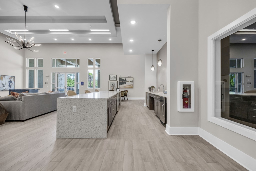 a kitchen and living room in a new home