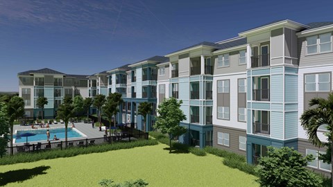 A modern apartment complex with a pool and green lawn.