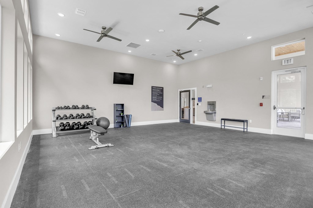 the workout room at the preserve at great pond apartments in great pond wi