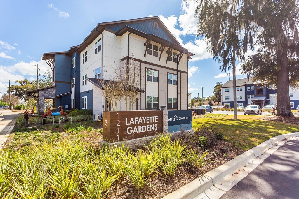 a large building with a sign that says lafayette gardens