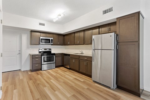 the preserve at ballantyne commons apartment kitchen with stainless steel appliances