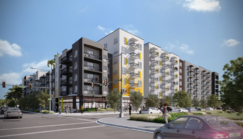 A modern apartment building with a mix of black and white and yellow accents.
