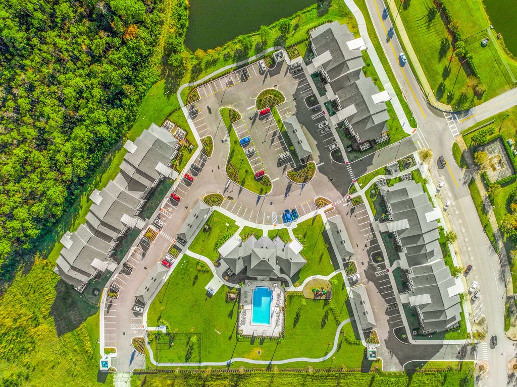 arial view of a campus with a swimming pool