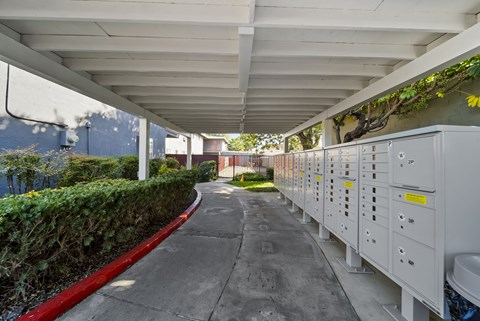 A long corridor with electrical boxes on the side.