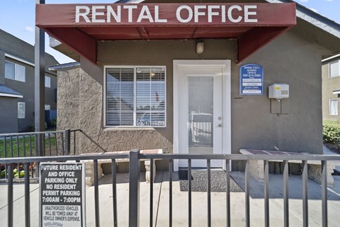 A rental office building with a sign that says "future resident and office parking only".