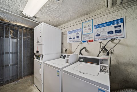 A room with industrial equipment and signs on the wall.