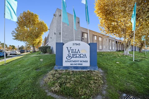 Villa Sterpa apartment complex with a sign in front.