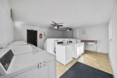 A laundry room with a washer and dryer.