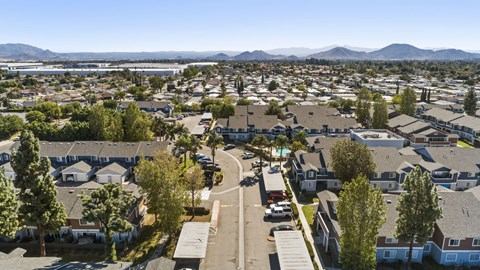 A residential area with houses and trees.